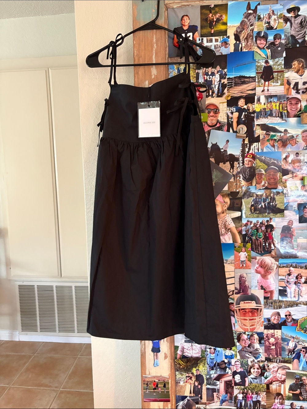 Alliana Lu black dress.
